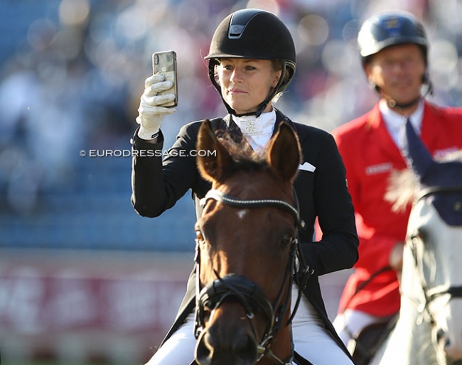 Athlete filming the Farewell to Nations in the CHIO Aachen main stadium. Depending if it's an "FEI Named Event" OR on the show's Terms and Conditions it is not allowed to post this footage on social media :: Photo © Astrid Appels