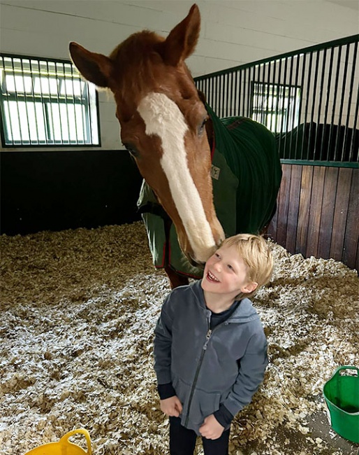 A 29-year old Mistral Hojris, aka Alf, with Laura's second son Wilfred at home in the U.K.