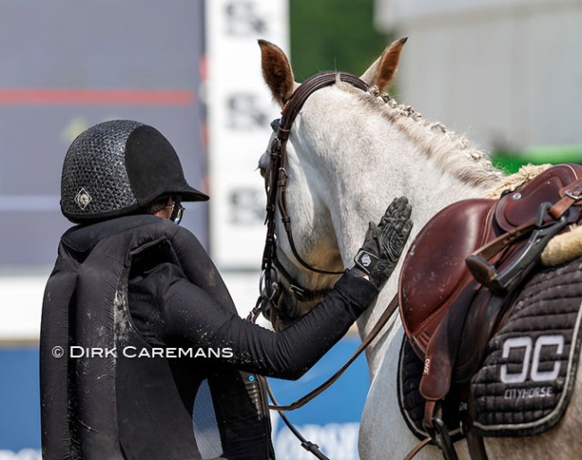 This safety vest did its job as this jumping rider fell off her horse :: Photo © Dirk Caremans