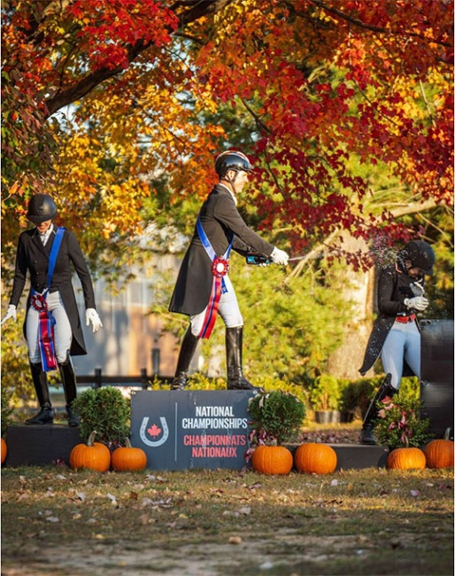 Jaimey Irwin leads the celebration on the FEI Medium Tour Open podium at the 2025 East Canada Dressage Championships :: Photo © Mousse Photographie