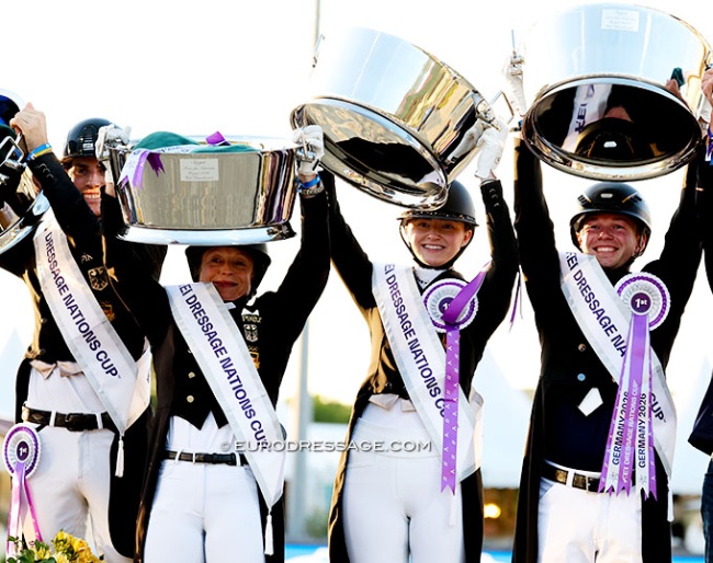 Germany lifting the heavy silver trophies for winning the FEI Nations Cup at the 2026 CDIO Hagen :: Photo © Astrid Appels