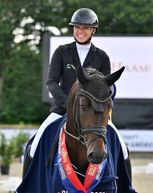 Brandi Roenick on the 4-year old stallion Dynamite (by  Debutant x Feinrich) :: Photo © OLD art